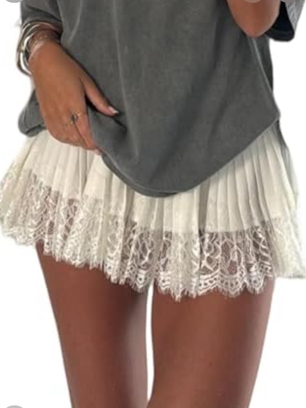 White pleated lace trim mini skirt with shorts